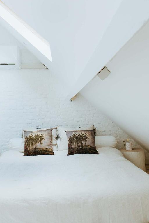 Letto o letti in una camera di Musa Antwerp