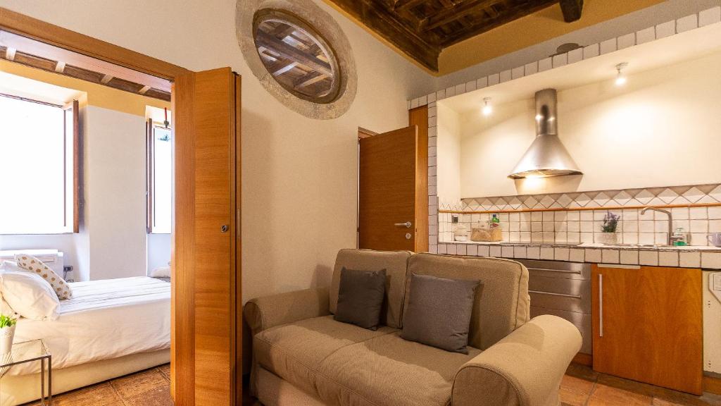 Posteľ alebo postele v izbe v ubytovaní Trastevere Alexander Rental in Rome