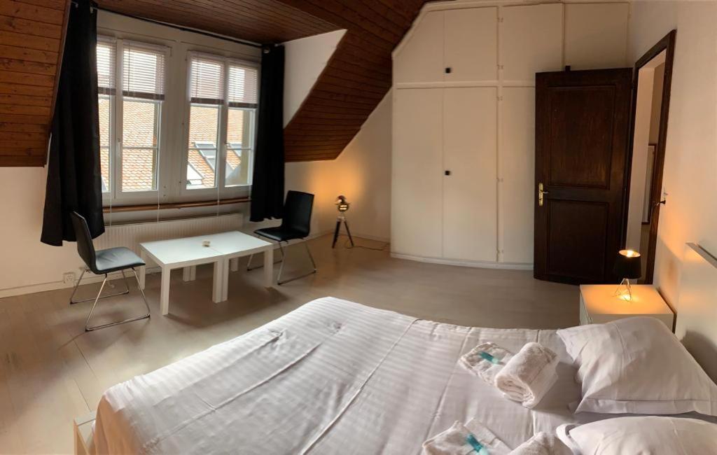 Postel nebo postele na pokoji v ubytování Residence Vue Chateau