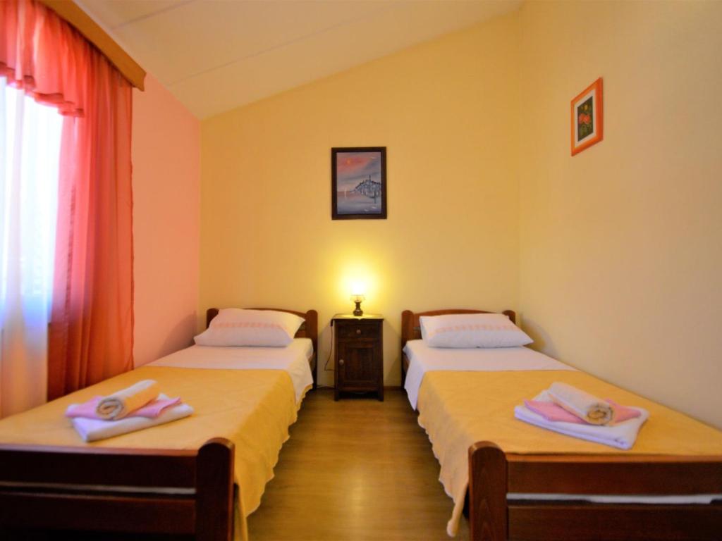 Postel nebo postele na pokoji v ubytování Holiday Home Milka 1 by Interhome