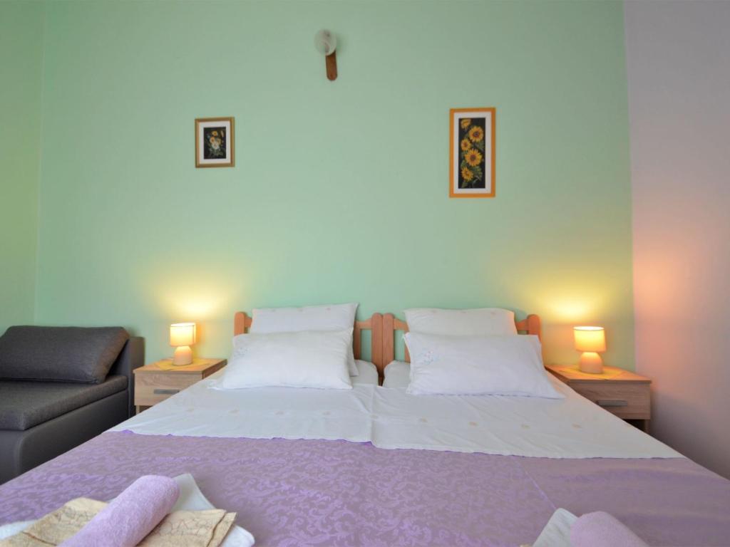 Postel nebo postele na pokoji v ubytování Holiday Home Milka 1 by Interhome
