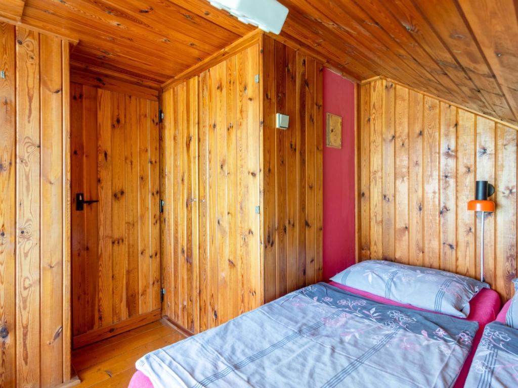 Postel nebo postele na pokoji v ubytování Holiday Home Zhorska by Interhome