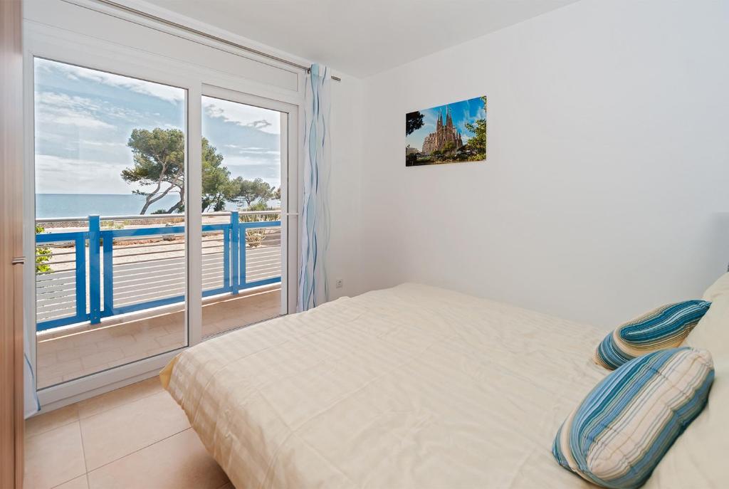 Postel nebo postele na pokoji v ubytování Apartamentos Mar y Sol