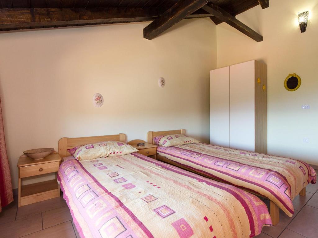 Posteľ alebo postele v izbe v ubytovaní Holiday Home Natura by Interhome