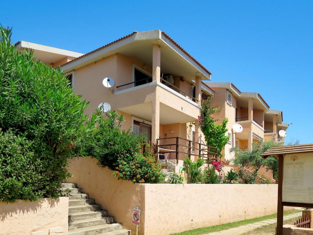 un edificio con scale di fronte di Apartment Il Borgo - PCR215 by Interhome a Villaputzu