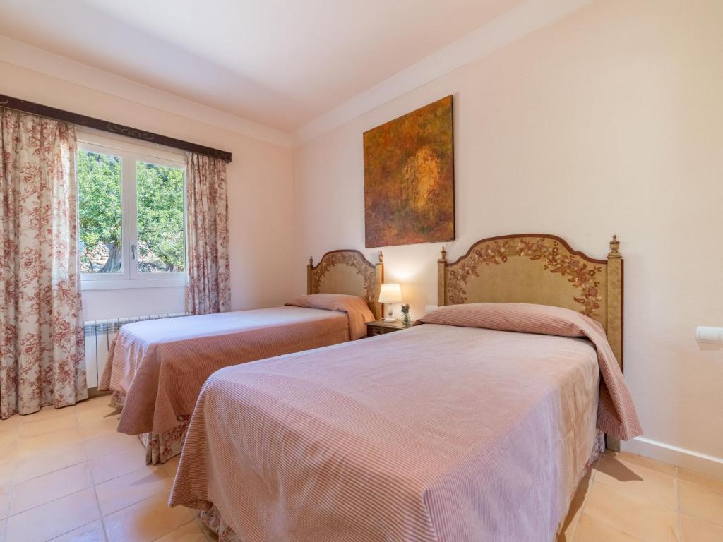 Postel nebo postele na pokoji v ubytování Villa Son Maguet by Interhome