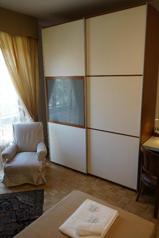 Łóżko lub łóżka w pokoju w obiekcie Avenue Rooms
