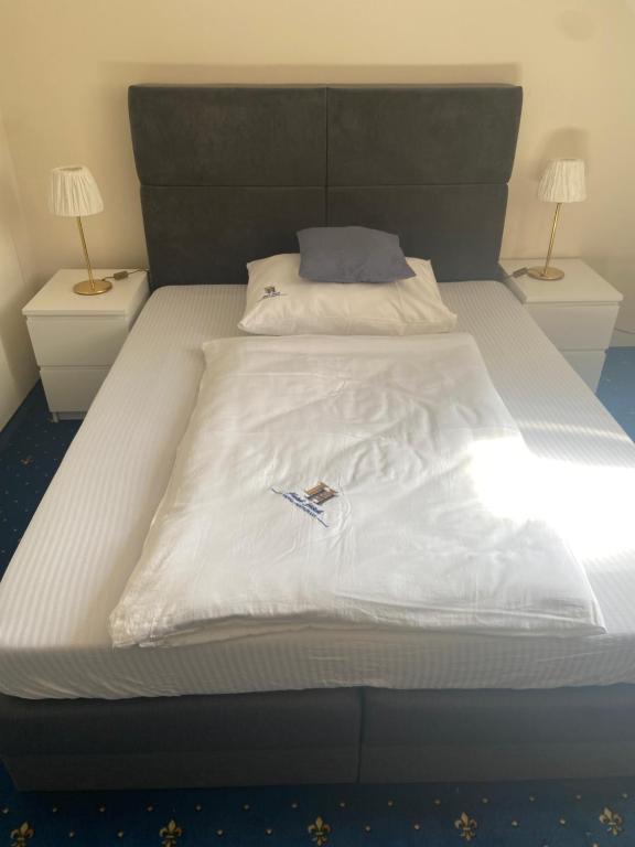 Postel nebo postele na pokoji v ubytování Hotel Restaurant Hesch