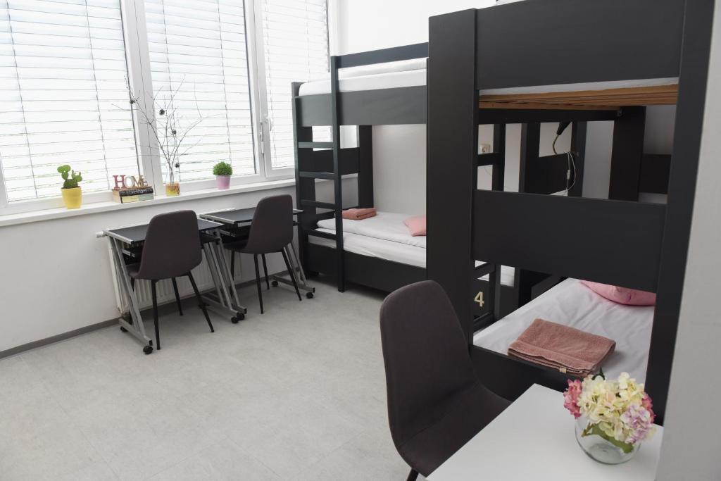 Postel nebo postele na pokoji v ubytování MS Sparrow Hostel