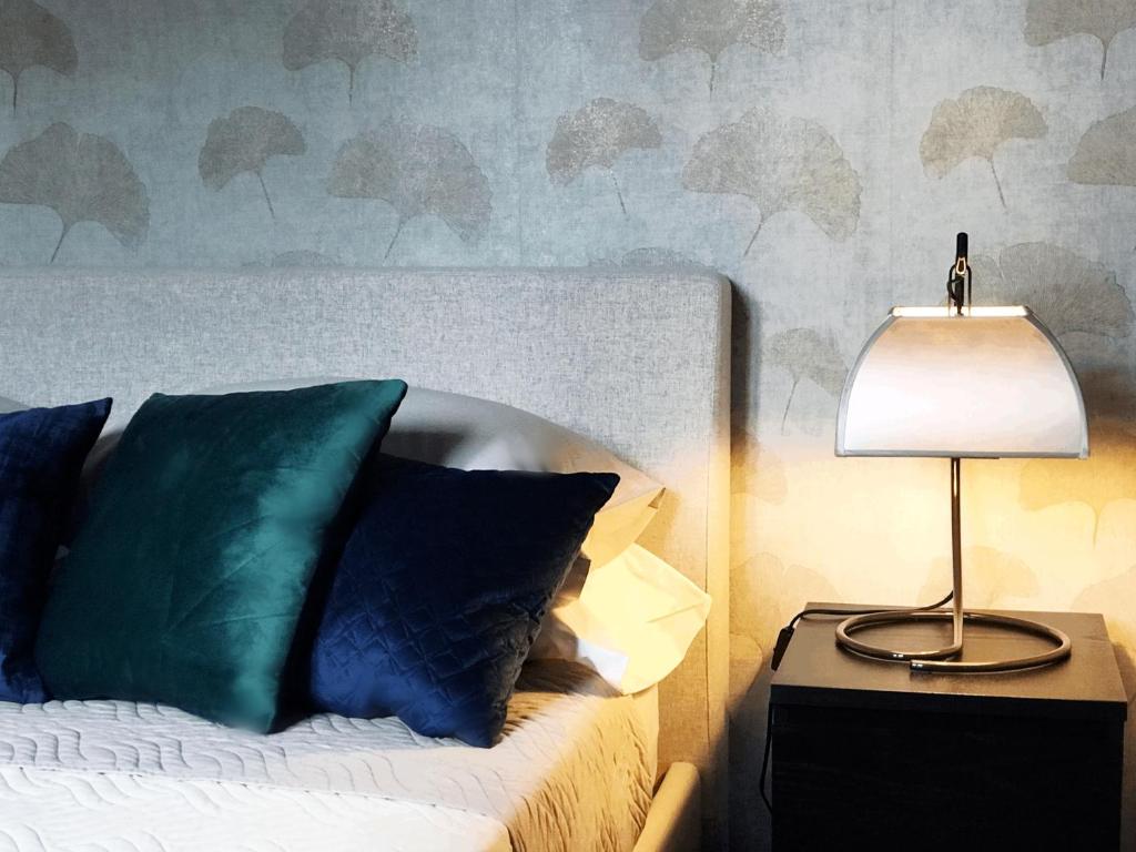A bed or beds in a room at VILLA MARRONE - Relais -
