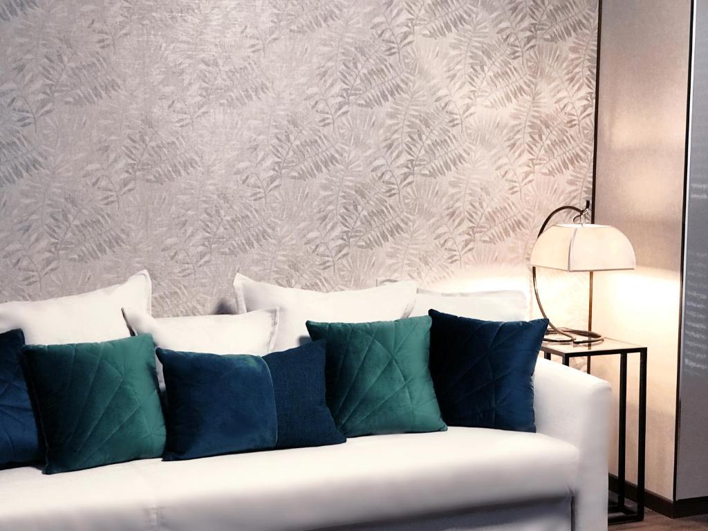 A bed or beds in a room at VILLA MARRONE - Relais -