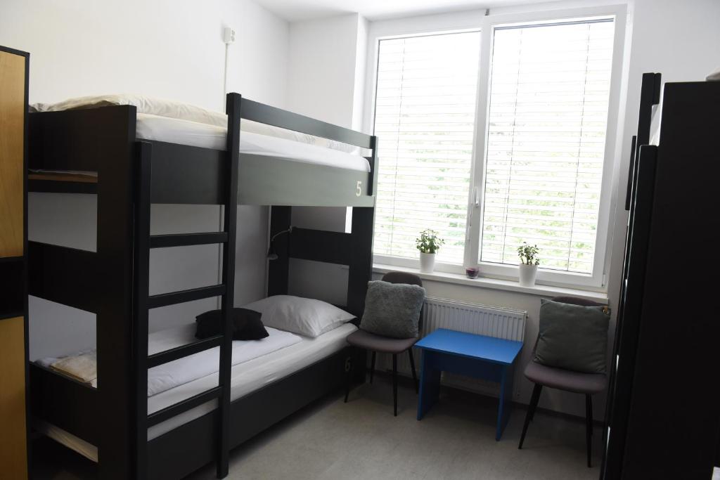 Postel nebo postele na pokoji v ubytování MS Sparrow Hostel