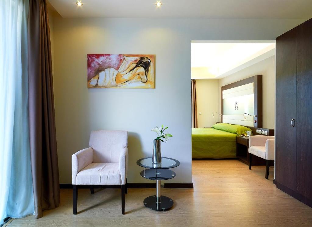 Postel nebo postele na pokoji v ubytování Arion Hotel