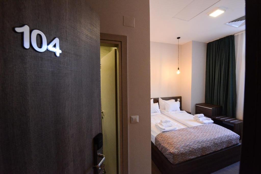 Postel nebo postele na pokoji v ubytování Hotel Cara 28