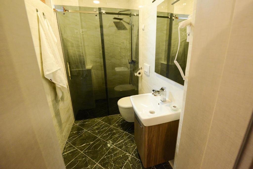 Koupelna v ubytování Hotel Cara 28
