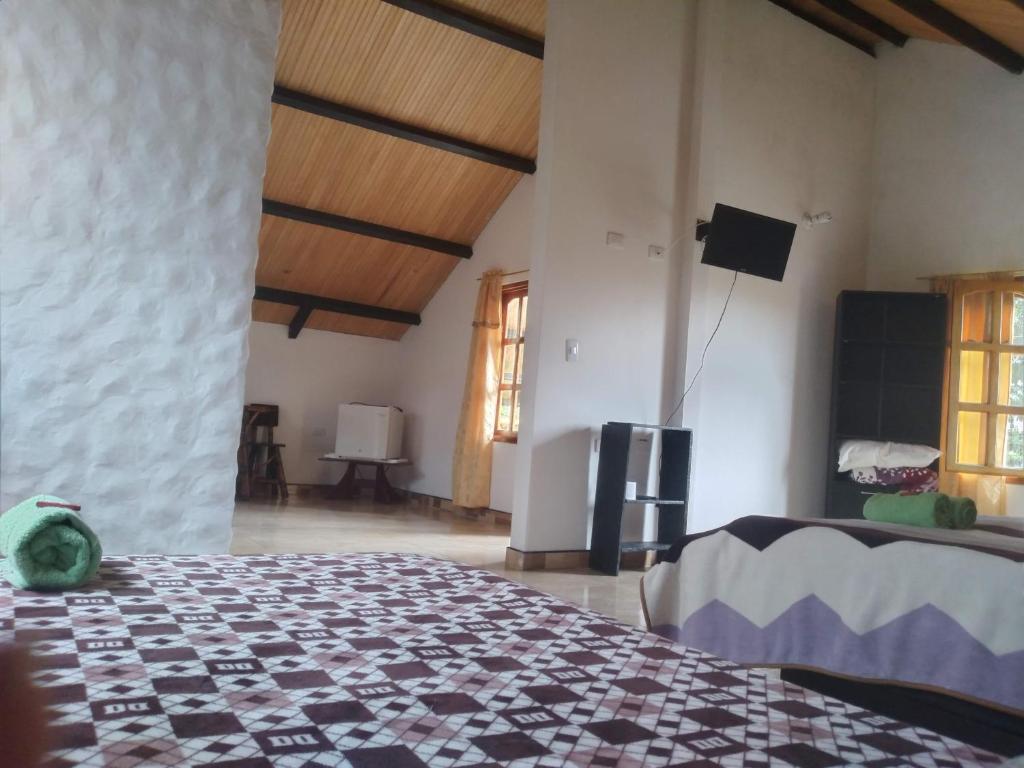 Voodi või voodid majutusasutuse Cabaña El Trebol toas