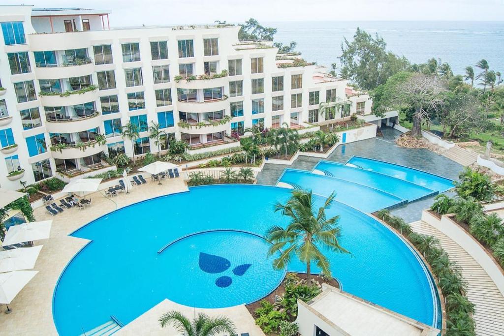 an overhead view of the pool at the resort at Kilua Beach Resort in Mombasa