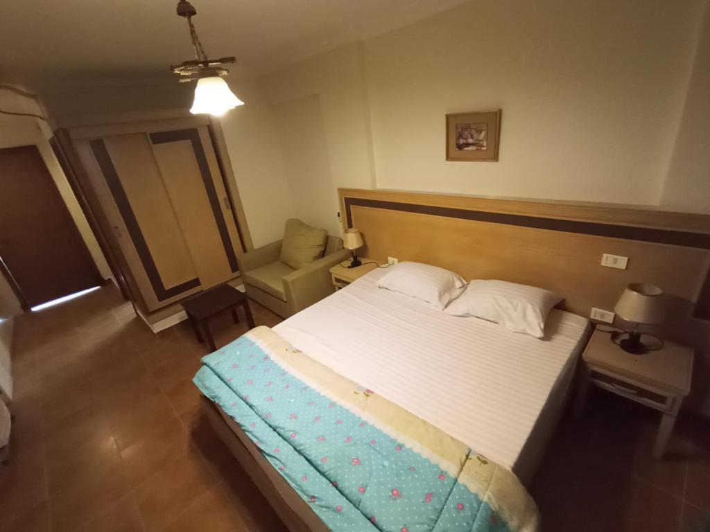 Postel nebo postele na pokoji v ubytování Oasis marsa alam