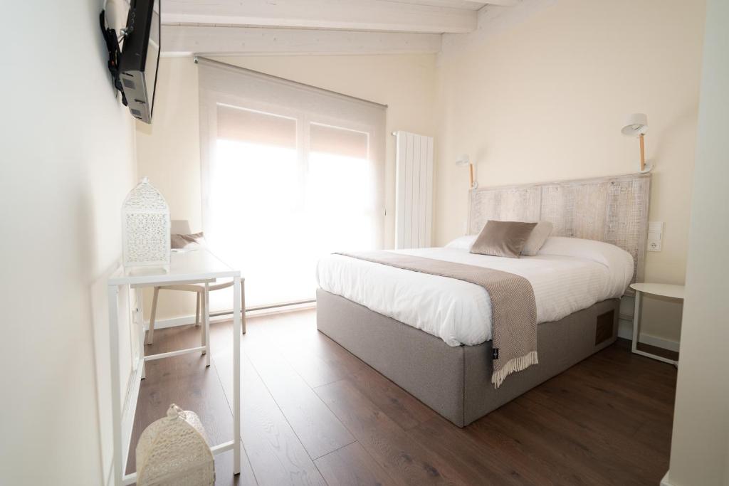 Postel nebo postele na pokoji v ubytování Hotel Rural La Casa de Mis Abuelos