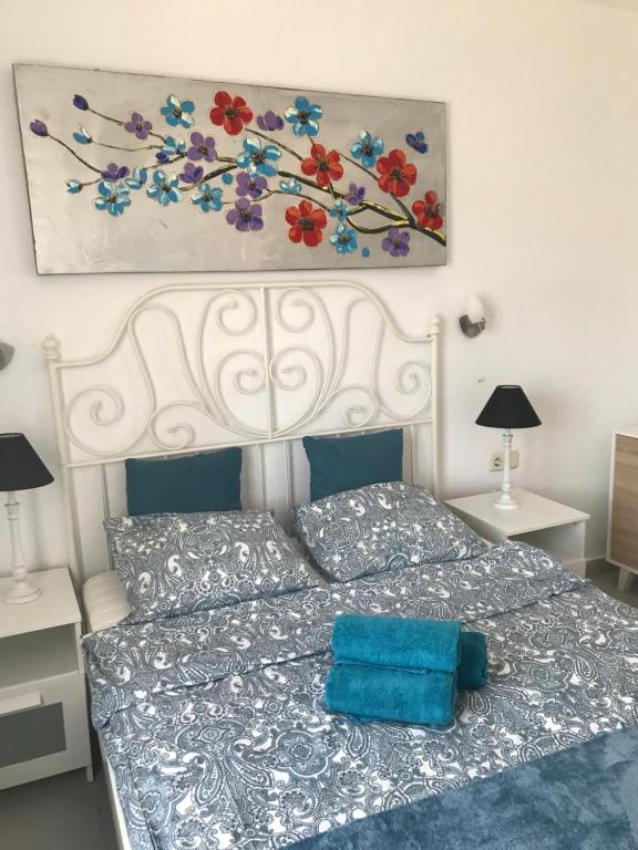 Posteľ alebo postele v izbe v ubytovaní Apartament J&P CostaCalma