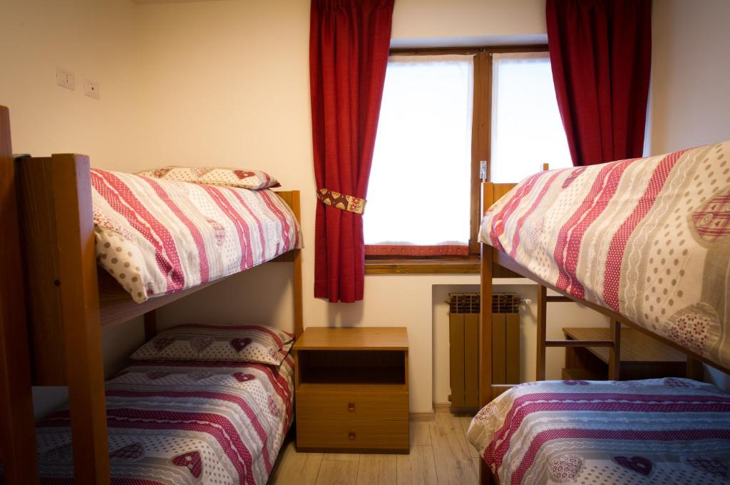Postel nebo postele na pokoji v ubytování Residence Ables