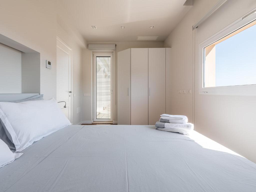 Posteľ alebo postele v izbe v ubytovaní Penthouse center