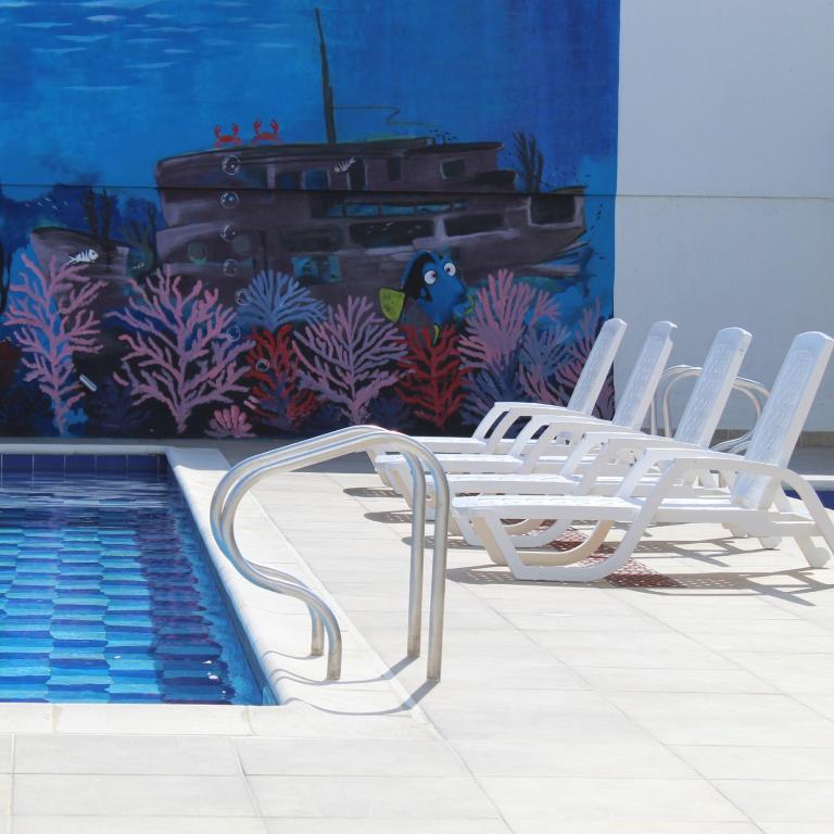 Bazén v ubytování Hotel Mar del Plata nebo v jeho okolí