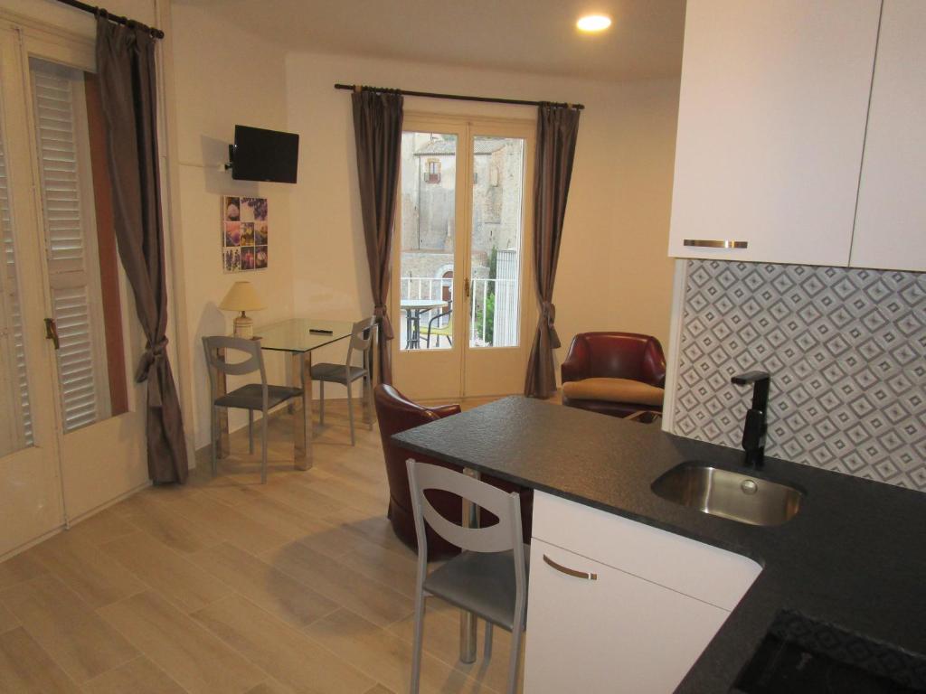 Kuchyň nebo kuchyňský kout v ubytování Hotel Apartaments Gesòria Porta Ferrada