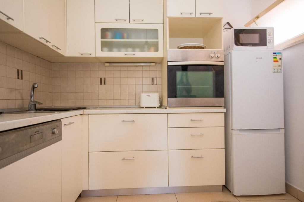 Kuchyňa alebo kuchynka v ubytovaní Apartment Mario Star