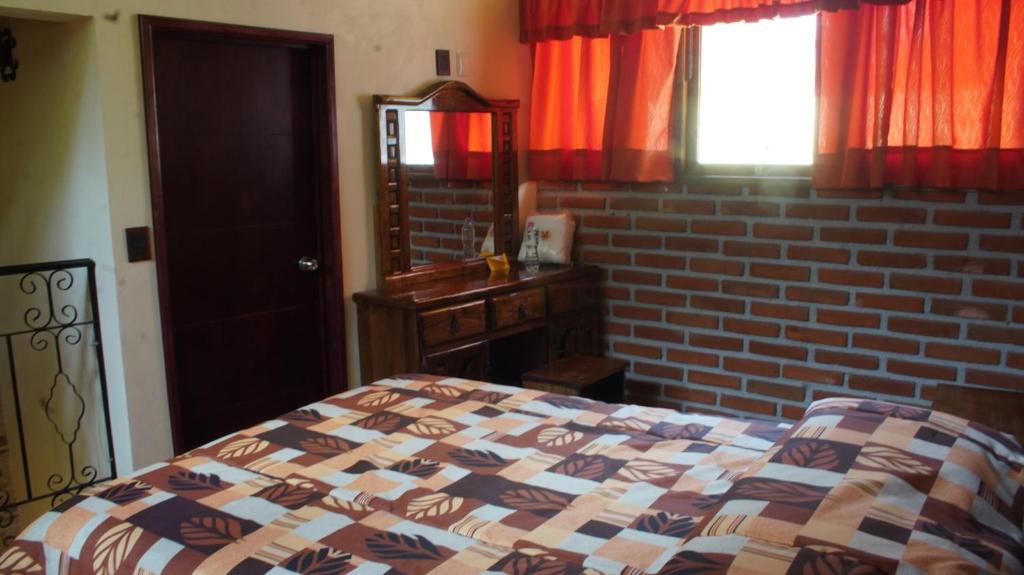 Postel nebo postele na pokoji v ubytování CABAÑAS CASTILLO