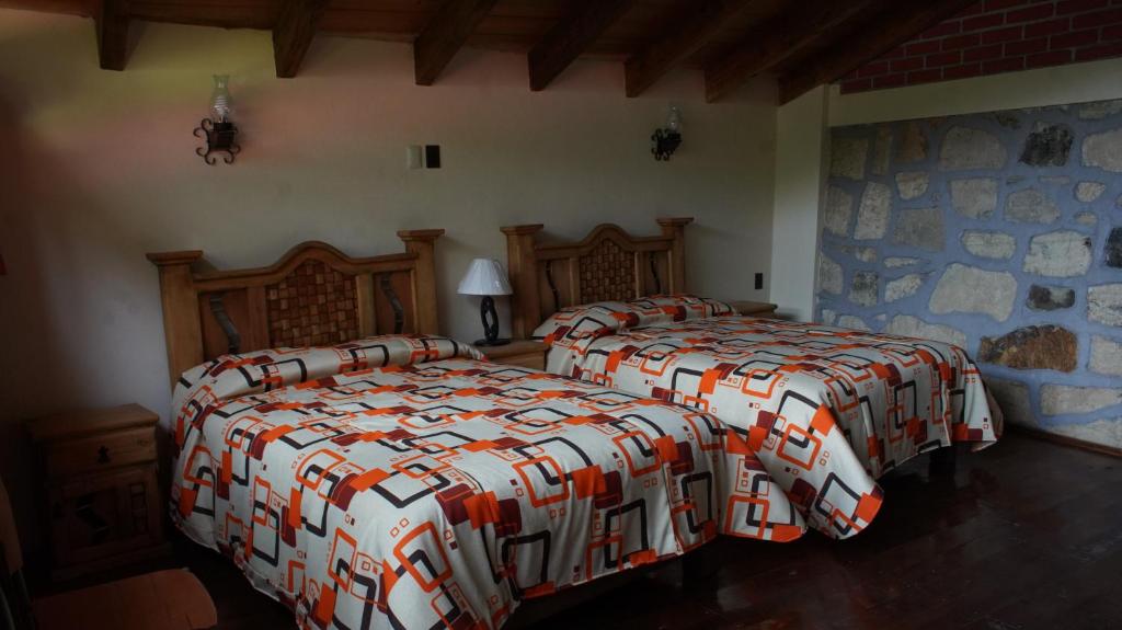 Postel nebo postele na pokoji v ubytování CABAÑAS CASTILLO