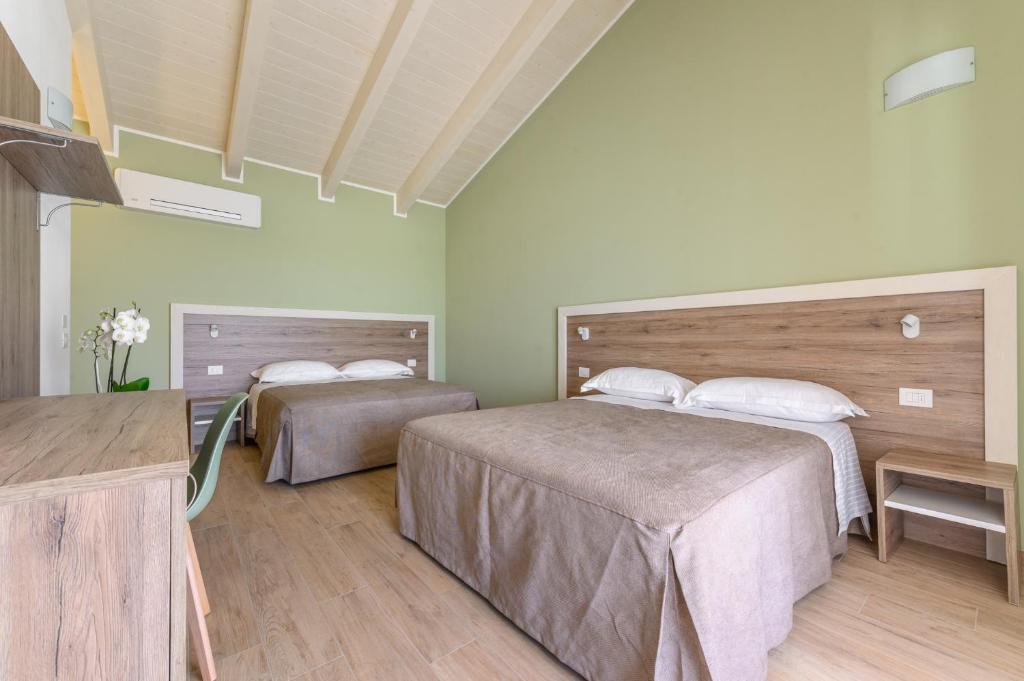 Postel nebo postele na pokoji v ubytování Terra Fina