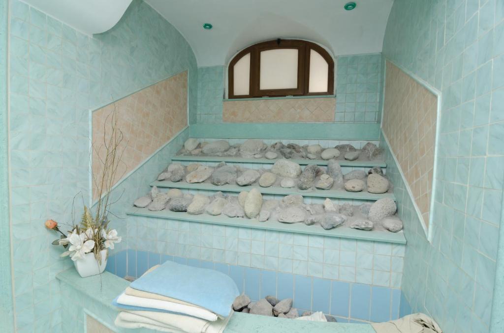 Postel nebo postele na pokoji v ubytování Hotel Felix Terme