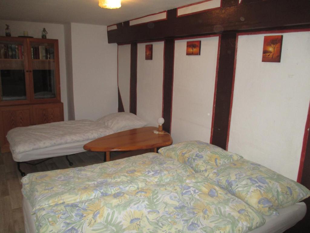 Säng eller sängar i ett rum på Alsfelder Apartment