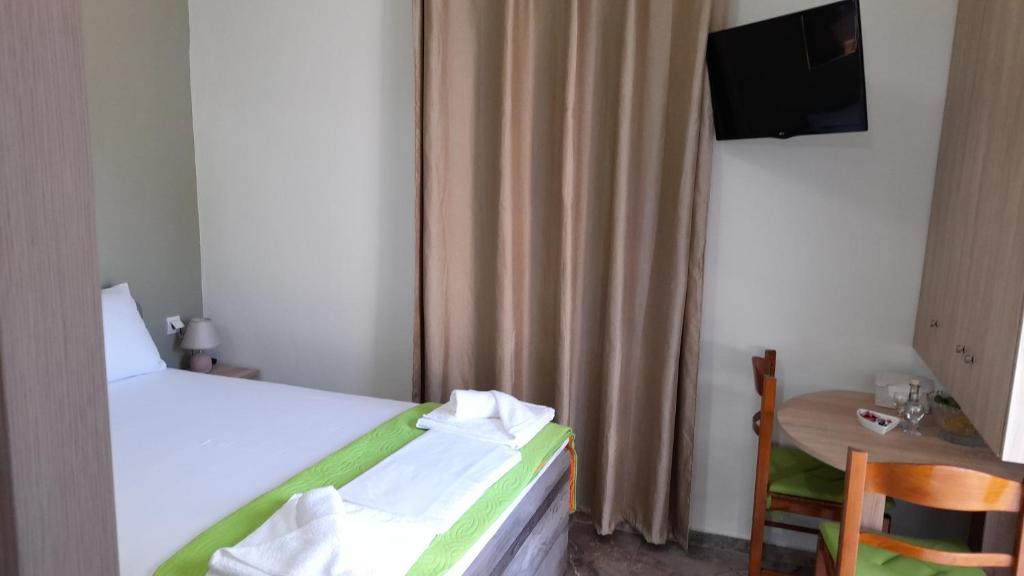 Televízia a/alebo spoločenská miestnosť v ubytovaní Kissamos Nice Apartment1