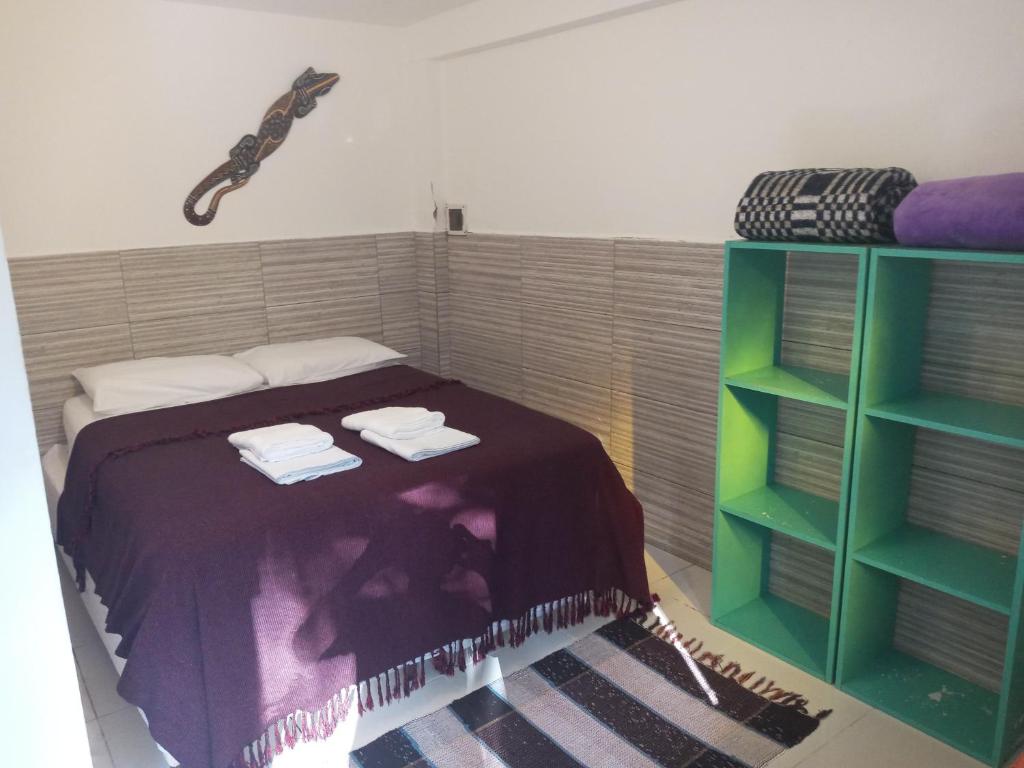 Postel nebo postele na pokoji v ubytování Pousada Cachoeira
