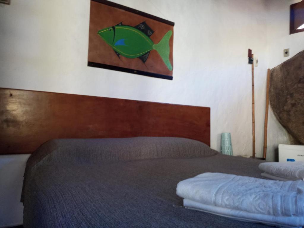 Postel nebo postele na pokoji v ubytování Pousada Cachoeira