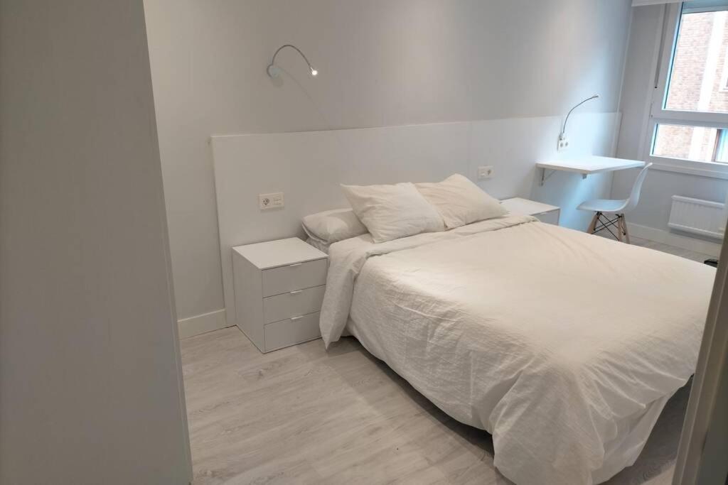 A bed or beds in a room at Apartamento recién reformado en Barakaldo