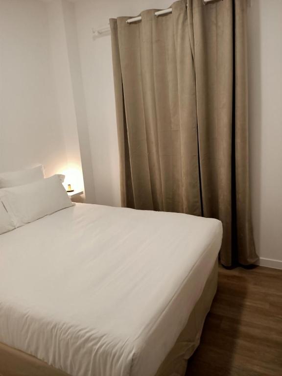 Postel nebo postele na pokoji v ubytování Best Western Plus Comedie Saint Roch