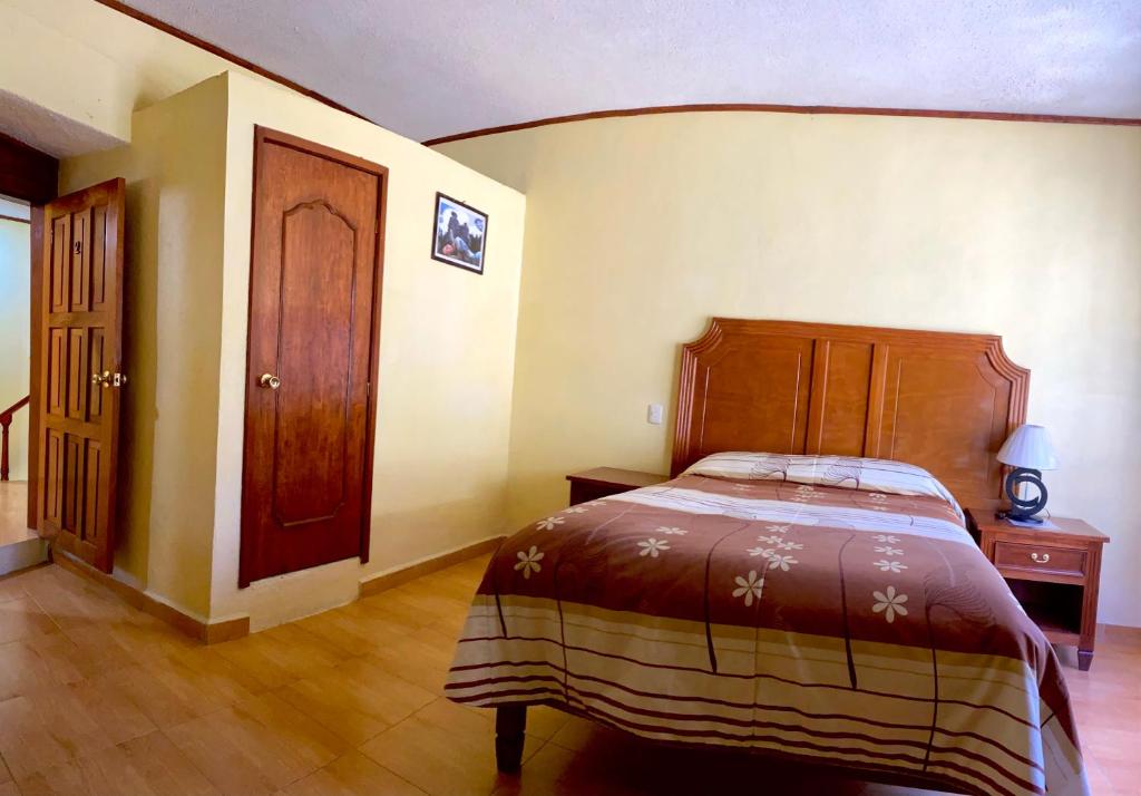 Postel nebo postele na pokoji v ubytování Posada Castillo