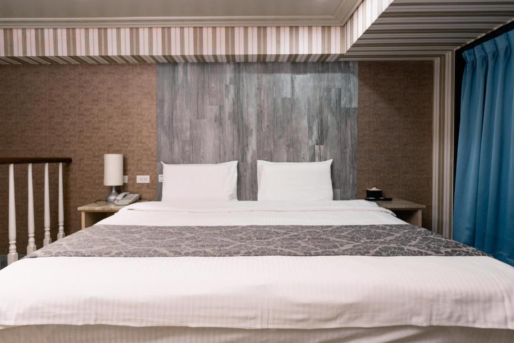 Postel nebo postele na pokoji v ubytování 58˚ Hotspring Hotel