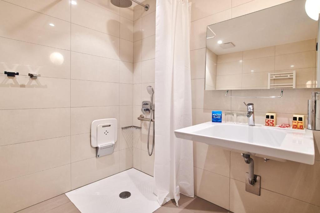 Koupelna v ubytování Hotel Park Plava Laguna