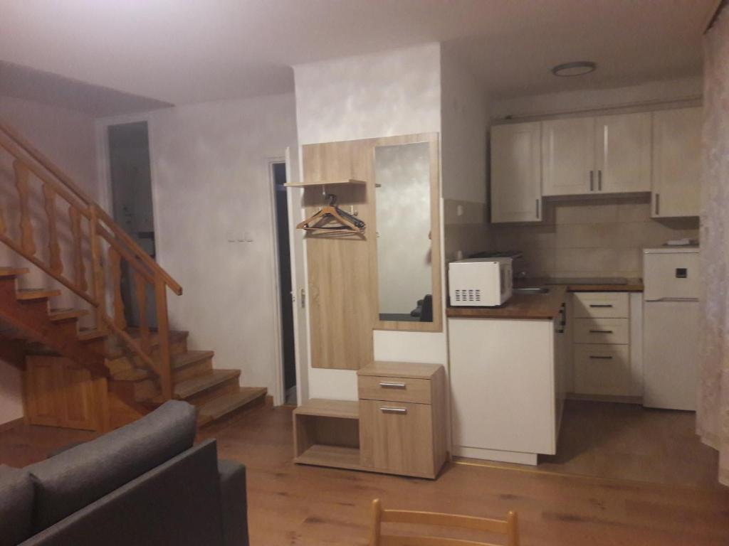 Kuchyň nebo kuchyňský kout v ubytování Tiszafa Apartman