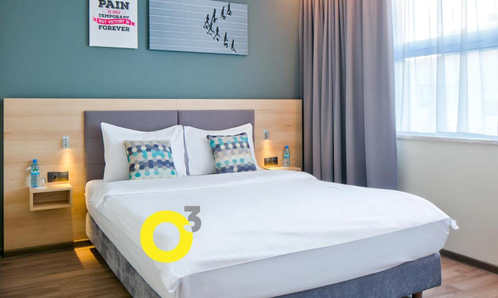 Posteľ alebo postele v izbe v ubytovaní o3Hotel