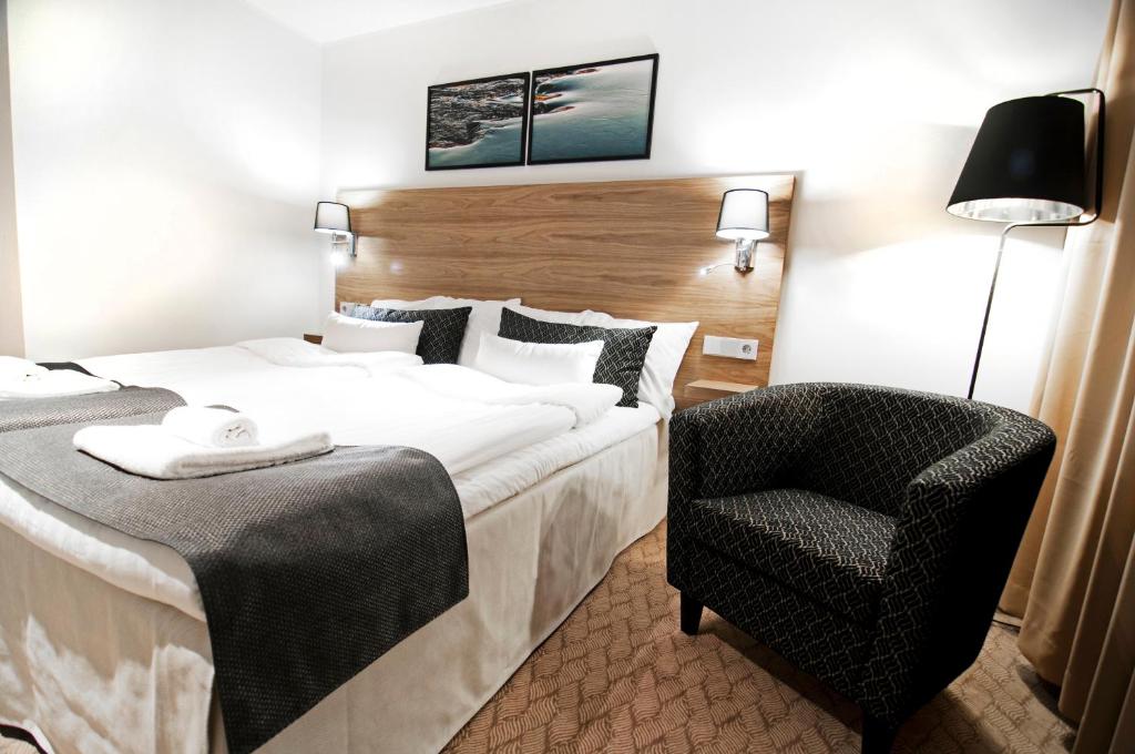 Postel nebo postele na pokoji v ubytování Hotell Fjället