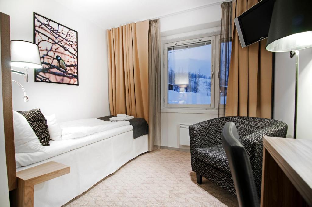 Postel nebo postele na pokoji v ubytování Hotell Fjället
