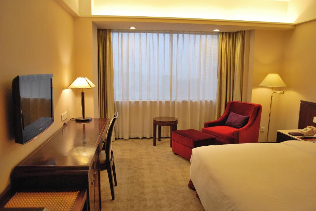 TV a/nebo společenská místnost v ubytování Zhongshan International Hotel