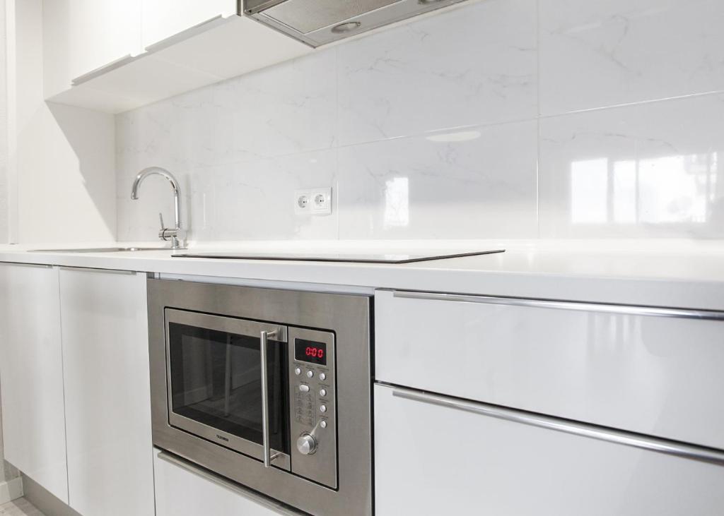 Kuchyňa alebo kuchynka v ubytovaní Apartamentos Stil Mar Anna - L'Escala Stil Mar