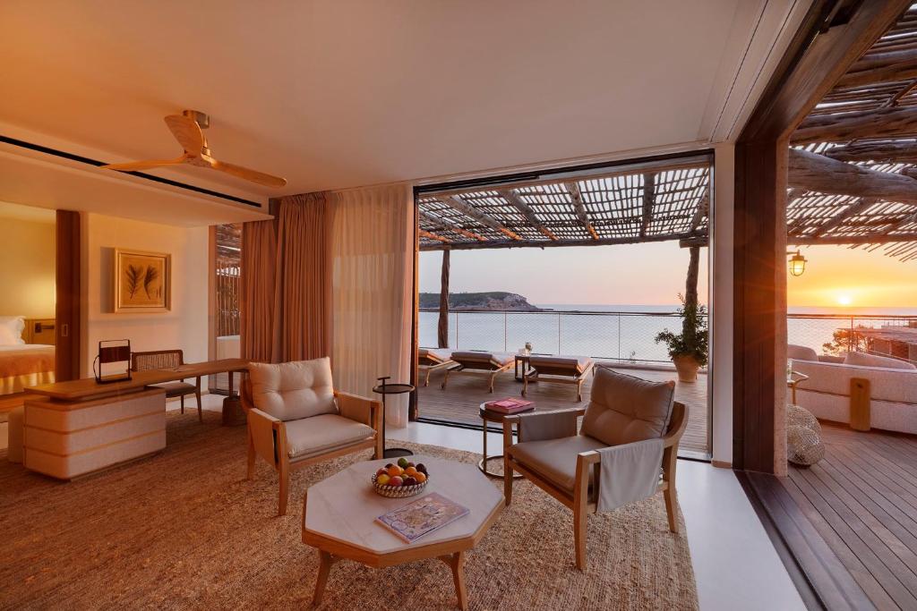 a living room with a view of the ocean at Six Senses Ibiza in Portinatx