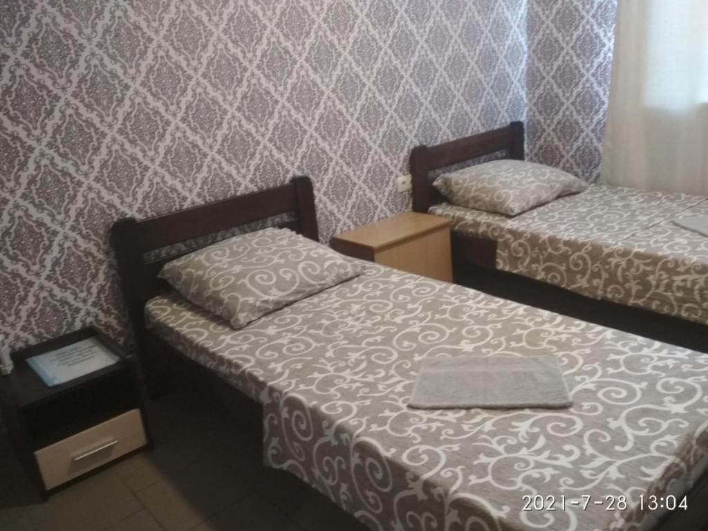 سرير أو أسرّة في غرفة في Hotel/Reastaurant Relax